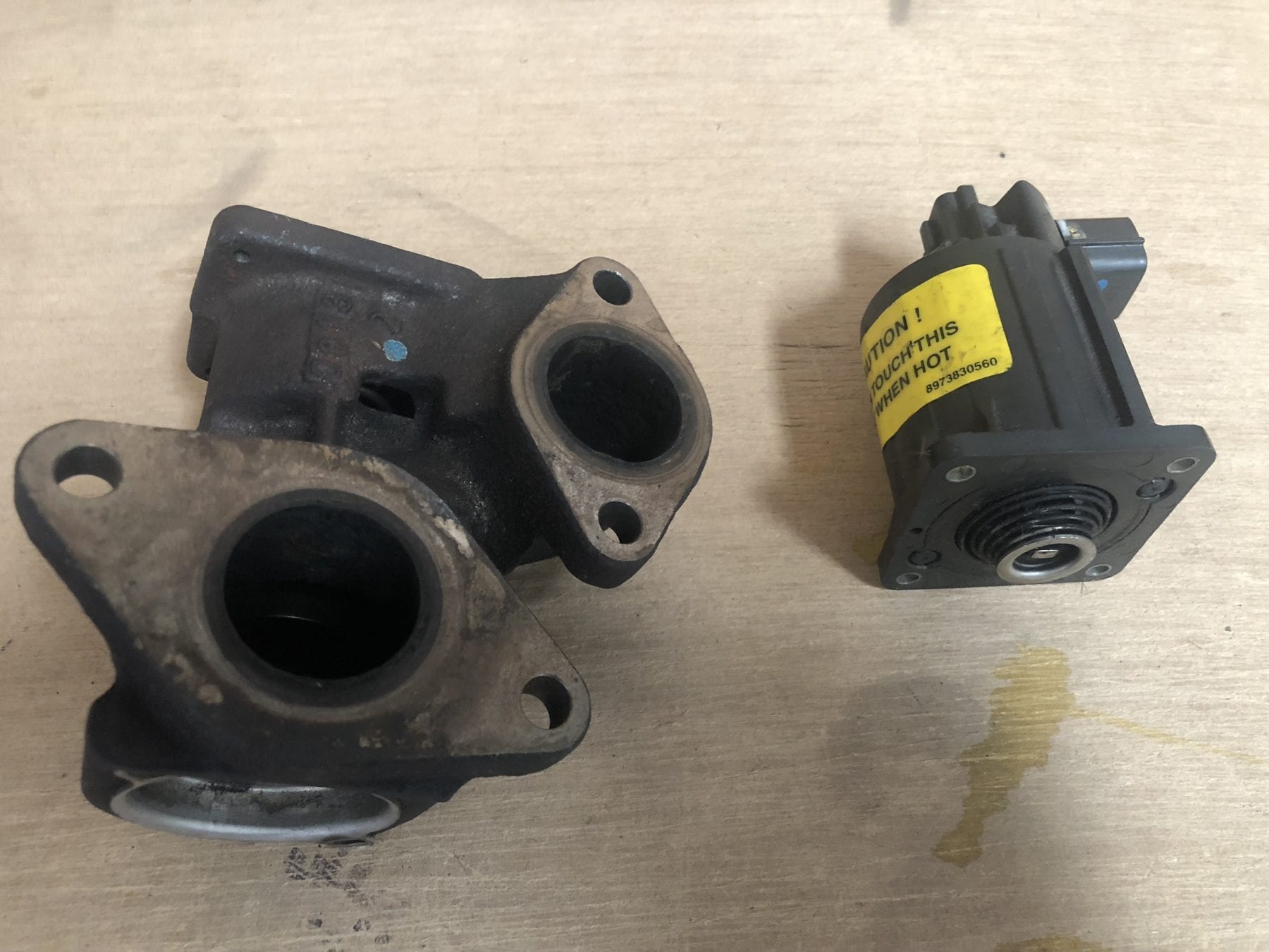 Faulty EGR valve removed due to heavy carbon and soot build-up