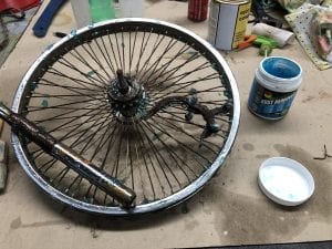 bike parts covered in rust remover gel